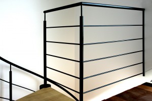 Helical ramp in black wrought iron patina